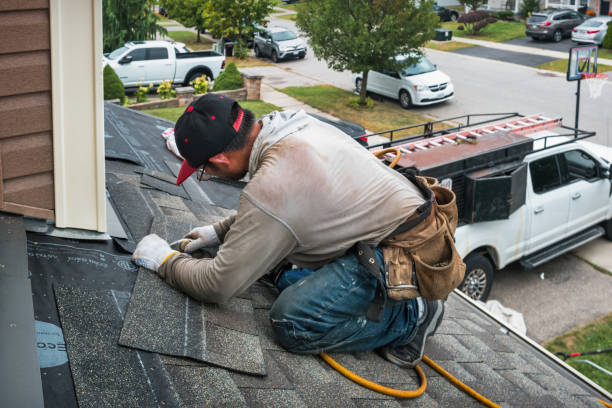Professional Roofing technician working in North Franklin, CT